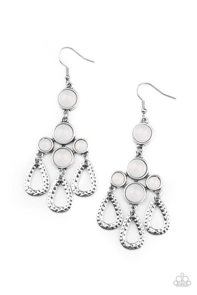 Mediterranean Magic - White and Silver Fashion Earrings - Paparazzi Accessories - A cluster of bubbly opalescent beaded frames give way to hammered silver teardrops, creating a mystical fringe. Earring attaches to a standard fishhook fitting. Sold as a pair of earrings.