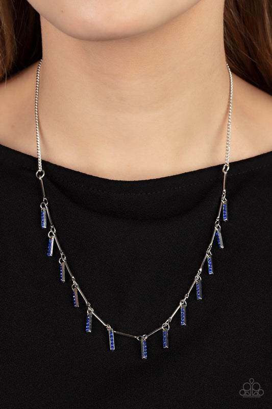 Metro Muse - Blue and Silver Necklace - Paparazzi Accessories - This unique necklace has glittery blue rhinestones, dainty silver rectangular frames between shiny silver bars along the collar, creating a dainty fringe. Features an adjustable clasp closure.