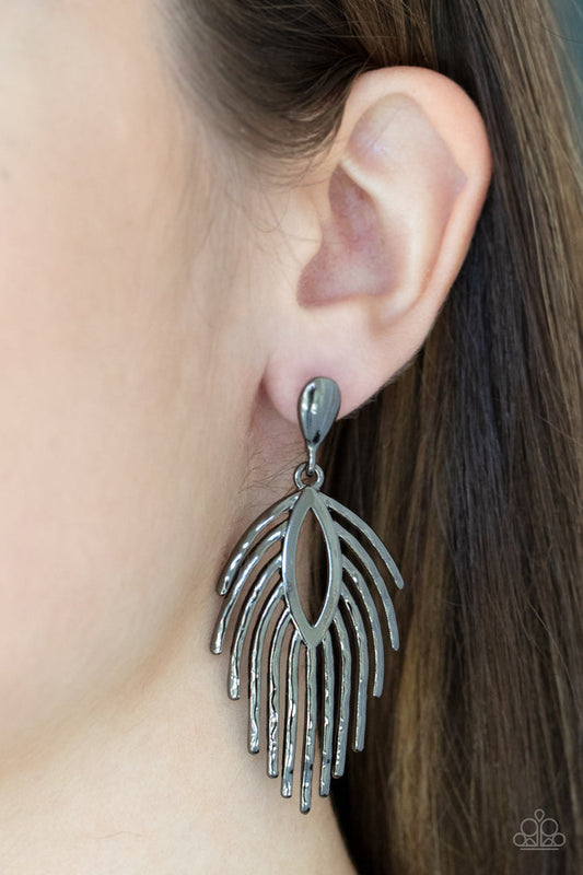 Metro Safari Black - Gunmetal - Post Earrings - Paparazzi Accessories - Anchored by a solid gunmetal bulb, gunmetal bars flare out and fall like shooting stars from an open marquise frame creating a captivating allure. Earring attaches to a standard post fitting.