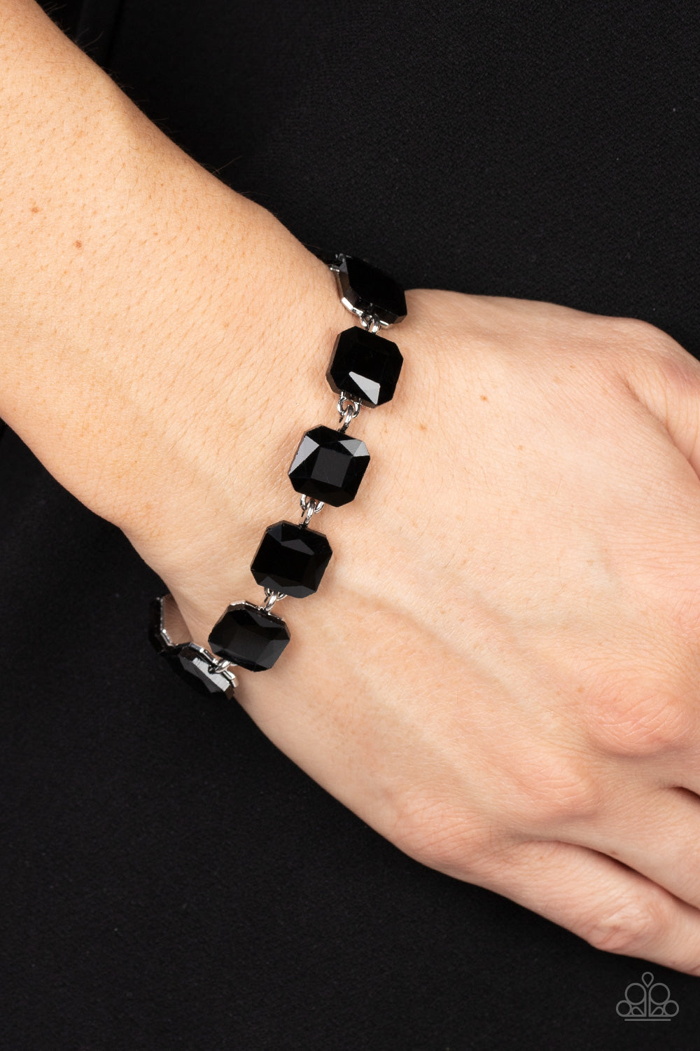 Mind-Blowing Bling - Black Rhinestone and Silver Bracelet  - Paparazzi Accessories - Featuring radiant cuts, glittery black rhinestones sit atop silver frames as they delicately link around the wrist for a mind-blowing brilliance. Features an adjustable clasp closure.