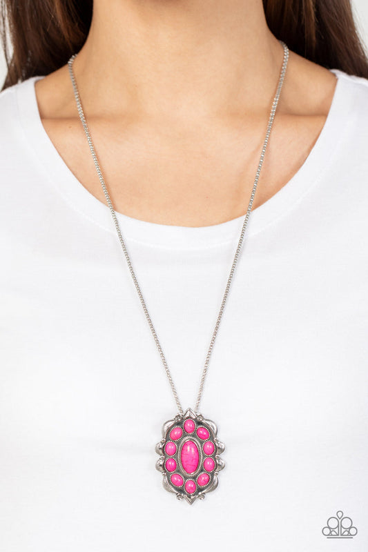 Mojave Medallion - Pink and Silver Necklace - Paparazzi Accessories - Vivacious pink oval stones embellish the front of a decoratively scalloped silver frame, creating an earthy floral pendant at the bottom of an extended silver popcorn chain. Features an adjustable clasp closure. Sold as one individual necklace.