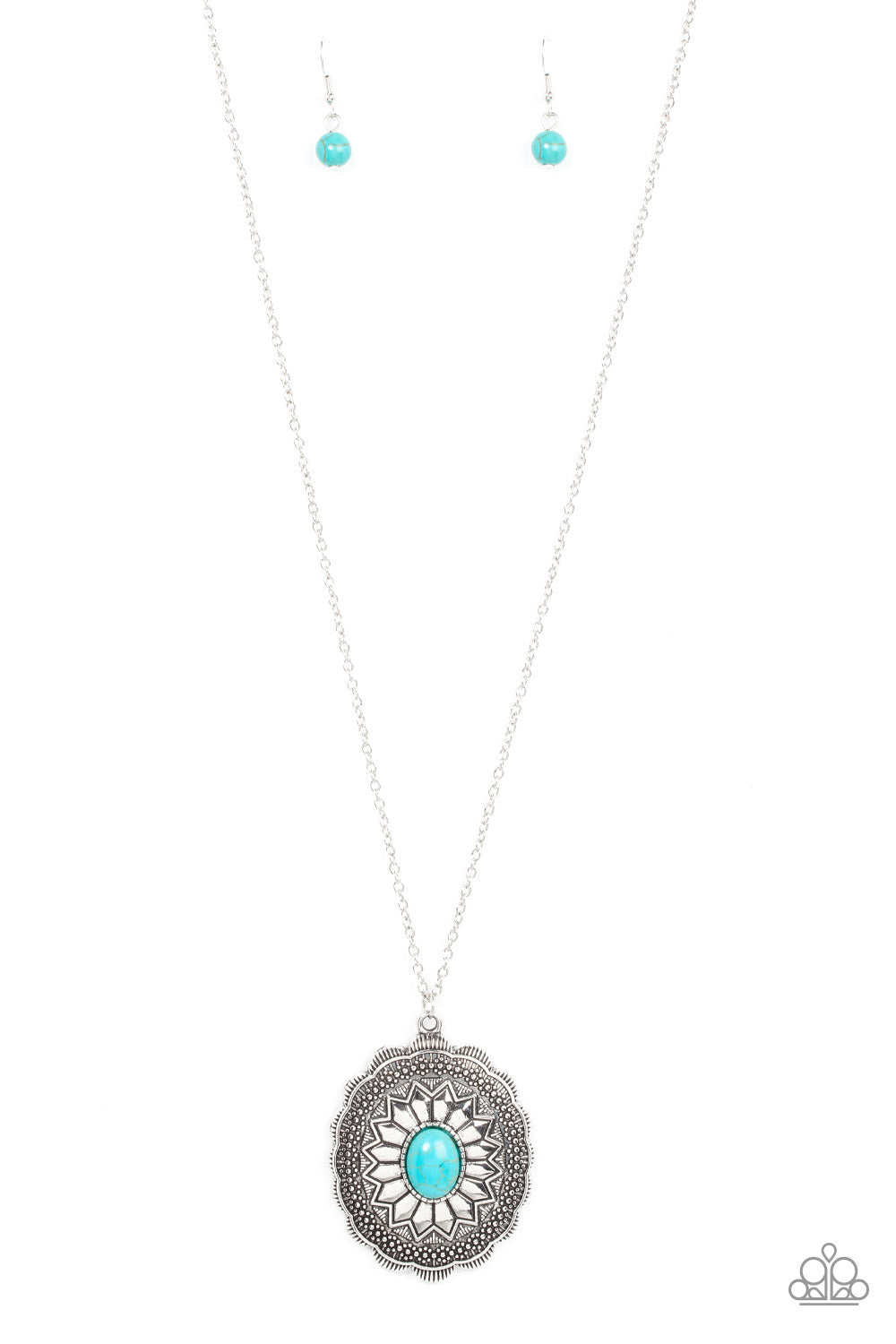 Mojave Mirage - Blue Turquoise and Silver Necklace - Paparazzi Accessories - An oval turquoise stone is pressed into the floral embossed center of a studded and scalloped silver frame at the bottom of an extended silver chain, creating an authentic floral pendant.
