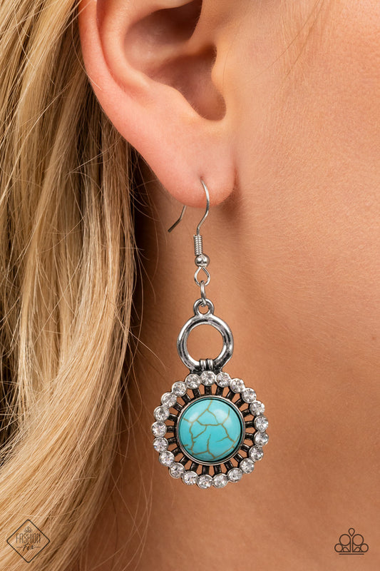 Mojave Mogul - Blue Turquoise and Silver Fashion Earrings - Paparazzi Accessories - Dainty circle of glassy white rhinestones fans out from a turquoise stone center, creating artisan inspired sparkle. Earring attaches to a standard fishhook fitting.