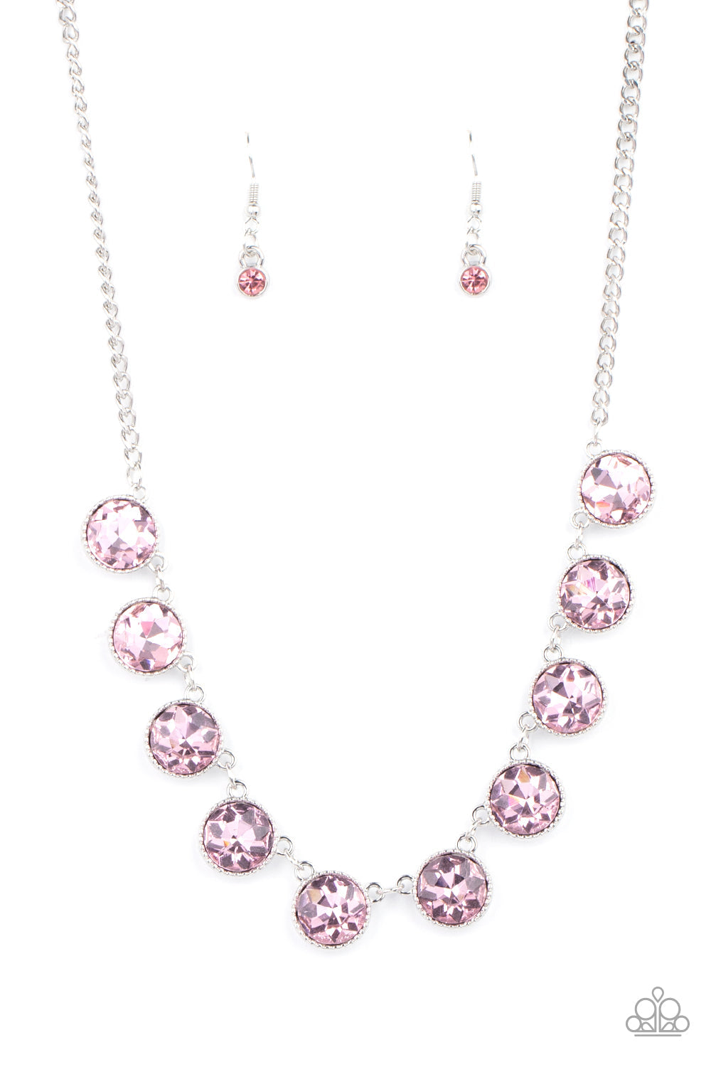 Mystical Majesty - Pink Gems and Silver Necklace - Paparazzi Accessories - 
Featuring a mystical iridescence, a sparkling display of round cut pink gems are encased in delicately textured silver frames as they link below the collar, creating a majestic statement piece. Features an adjustable clasp closure.
