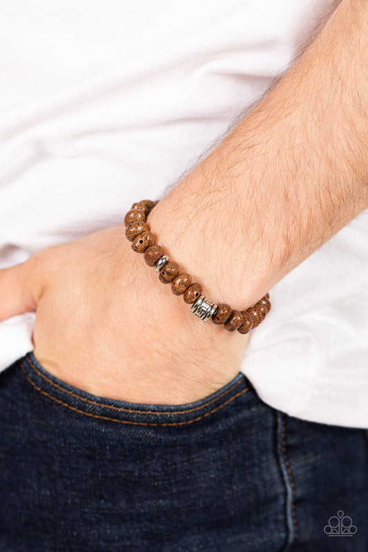 Natural State of Mind - Brown Stretchy Urban Bracelet - Paparazzi Accessories - Featuring a natural finish, a collection of faux brown stones are threaded along a stretchy band around the wrist. Shimmery silver accents are added to the earthy compilation for an artisan inspired finish. Sold as one individual bracelet.