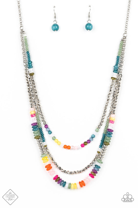 Newly Neverland - Multi Color and Silver Necklace - Paparazzi Accessories - silver beads combine with a collection of solid, milky, and cloudy beads in varying sizes and colors, to create a playful trio of silver layers down the chest. Featured in colors of Waterspout, Loden Frost, white, purple, fuchsia, baby pink, Orange Tiger, Samoan Sun, Midnight, and Martini Olive, the beads create a youthful and energetic impression that will never grow up, as the colorful layers connect to an elongated silver chain.