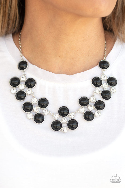 Night at the Symphony - Black and Silver Necklace - Paparazzi Accessories - Sleek silver frames adorned in a refined mix of oversized black beads and glassy white rhinestones, delicately link below the collar for a dramatically glamorous look. Features an adjustable clasp closure. Sold as one individual necklace.