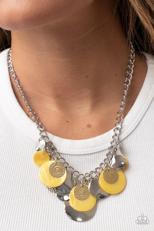 Oceanic Opera - Yellow and Silver Necklace - Paparazzi Accessories - A summery collection of bent silver discs, yellow shell-like discs, and silver mandala-like accents cascades from a pair of layered silver chains, resulting in a bubbly and boisterous fringe below the collar. Features an adjustable clasp closure.