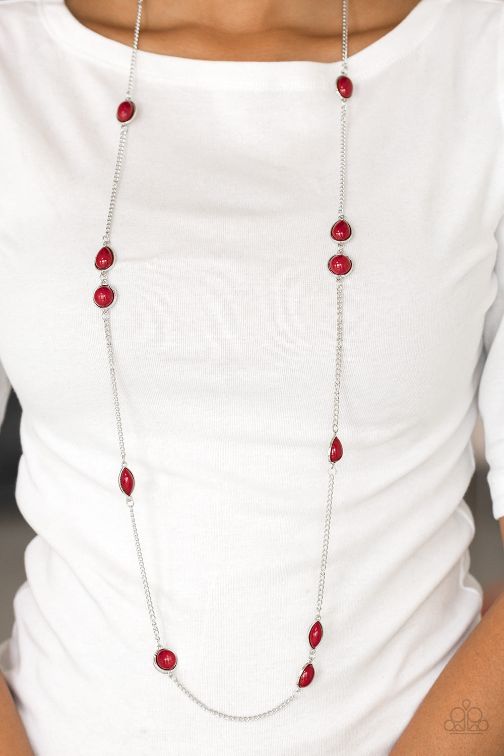 Pacific Piers - Red and Silver Fashion Necklace - Paparazzi Accessories - Featuring round and teardrop shapes, rich red beading trickles along an elongated silver chain for a seasonal look. Features an adjustable clasp closure. Sold as one individual necklace.