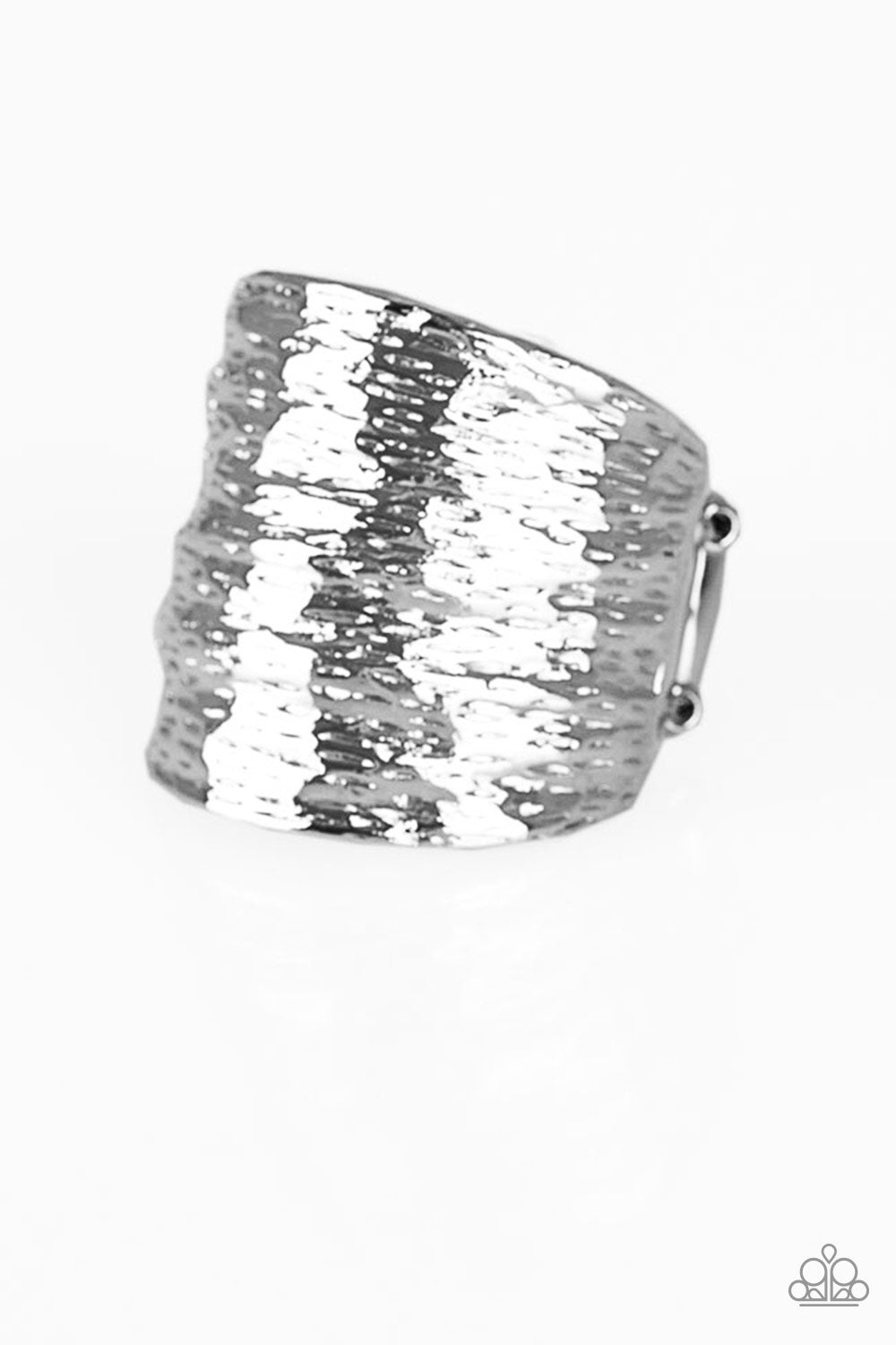 Paleo Patterns - Silver Ring - Flexible Fit - Paparazzi Accessories - Radiating with patterns derived from nature, a rippling silver frame curves around the finger for a bold look. Features a stretchy band for a flexible fit. Sold as one individual ring.