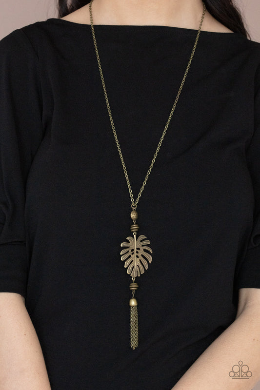 ​Palm Promenade - Brass Palm Leaf Necklace - Paparazzi Accessories - Infused with brass beaded accents, a lifelike brass palm leaf frame attaches to the bottom of a rustic brass chain. An antiqued brass chain tassel swings from the bottom, adding flirtatious movement to the summery statement piece.