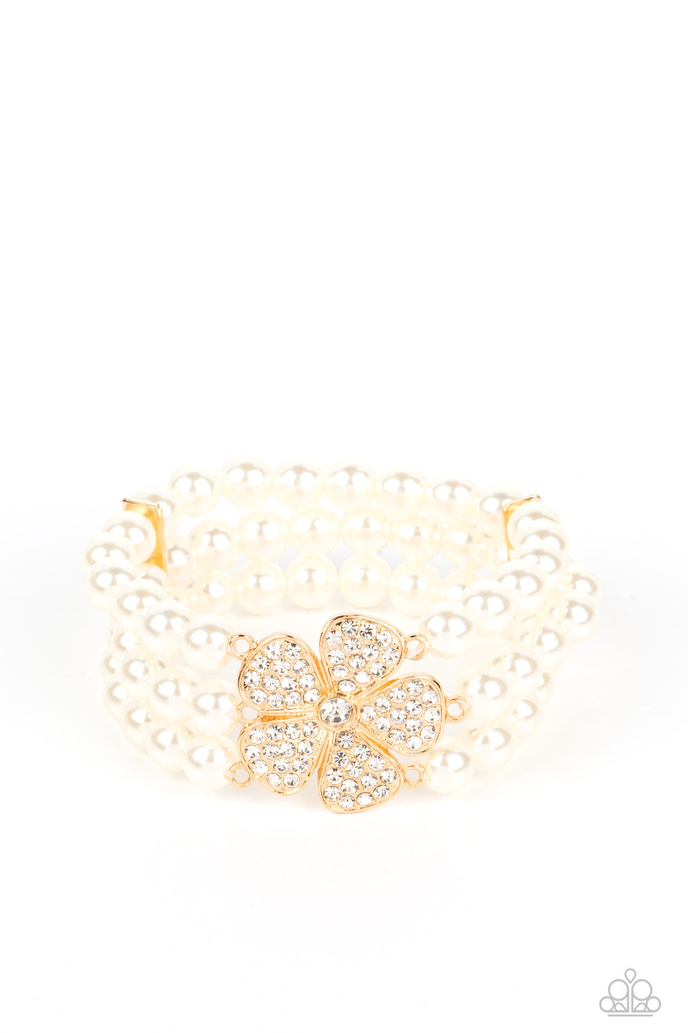 Park Avenue Orchard - Gold and White Pearl Flower Bracelet - Paparazzi Jewelry - Bejeweled Accessories By Kristie - Separated by dainty gold plates, classic white pearls are threaded along three stretchy bands around the wrist. Encrusted in glassy white rhinestones, a glitzy gold flower blooms at the center of the wrist for a fierce floral statement. Sold as one individual bracelet.