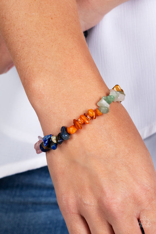Pebbled Plains - Multi Color Pebble Bracelet - Paparazzi Accessories - An earthy collection of turquoise, lapis, jade, amethyst, Tiger's eye, orange, gray, and pink pebbles are threaded along a stretchy band around the wrist for a Southwestern finish. Sold as one individual bracelet.