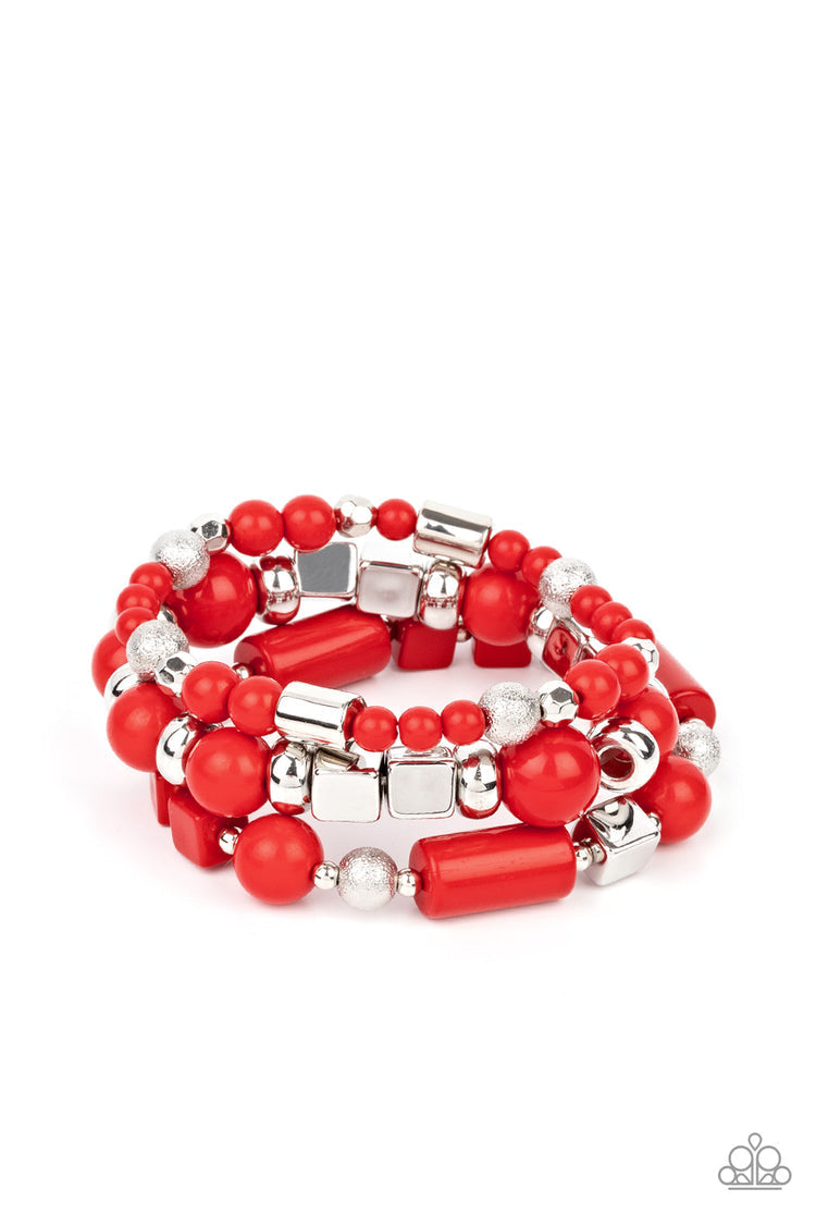 Perfectly Prismatic - Red and Silver Fashion Bracelets - Paparazzi Accessories - Round and cube colorful collection of Red Maple and silver beads are threaded along stretchy bands around the wrist, creating vivacious layers. Sold as one set of three bracelets. Trendy fashion jewelry for everyone.