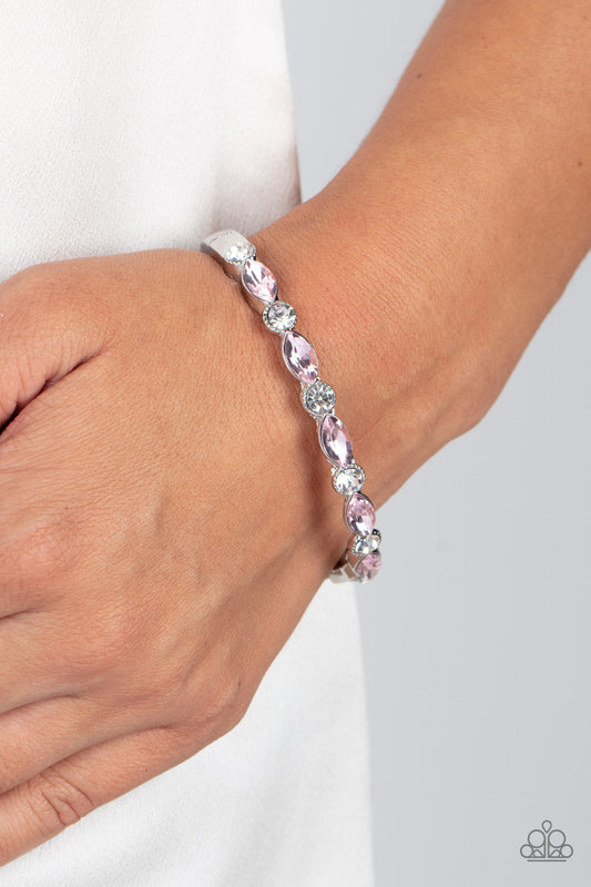 Petitely Powerhouse - Pink and Silver Bracelet - Paparazzi Accessories - A sparkly collection of round white rhinestones and marquise pink rhinestones alternate across the top of the wrist, coalescing into a stackable bangle-like bracelet.