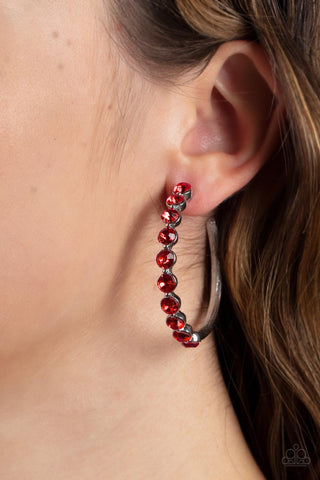 Photo Finish - Red Sparkle Hoop Earrings - Paparazzi Accessories - The front of a bold silver hoop is encrusted in fiery red rhinestones, creating a glamorous pop of sparkle. Earring attaches to a standard post fitting. Hoop measures approximately 1 3/4" in diameter. Sold as one pair of hoop earrings.