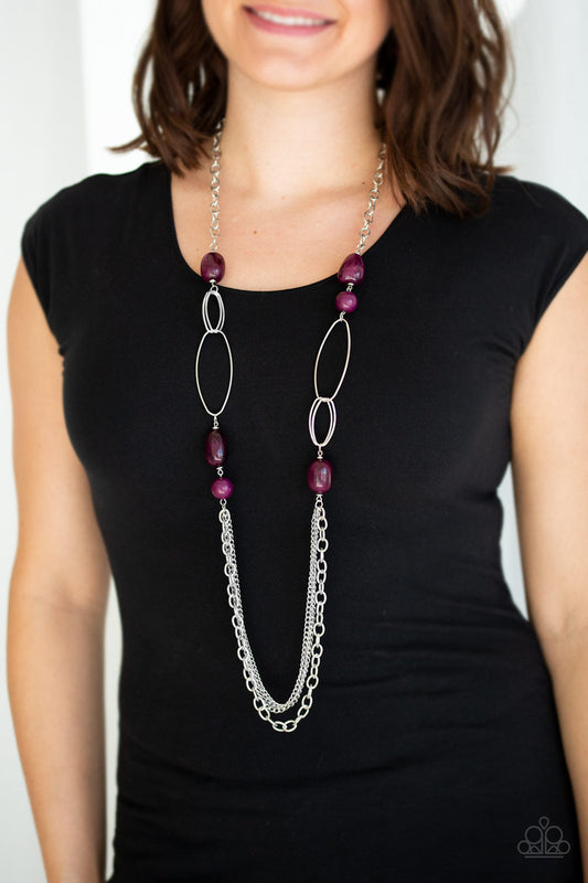 Pleasant Promenade - Purple and Silver Necklace - Paparazzi Accessories - Polished and cloudy faux rock finishes, Magenta Purple beads link with bold silver hoops. The whimsical compilation gives way to layers of mismatched silver chains for a seasonal finish. Features an adjustable clasp closure. Sold as one individual necklace.