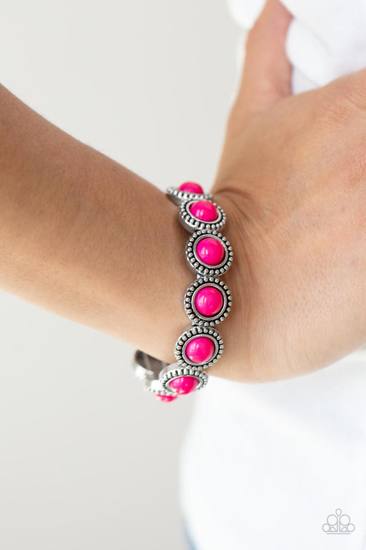 Polished Promenade - Pink Raspberry - Silver Stretchy Bracelet - Paparazzi Accessories  - Silver frames encase polished Raspberry Sorbet beads. The eye-catching series of fanciful beads are threaded along a stretchy band and promenade around the wrist for a whimsical look.