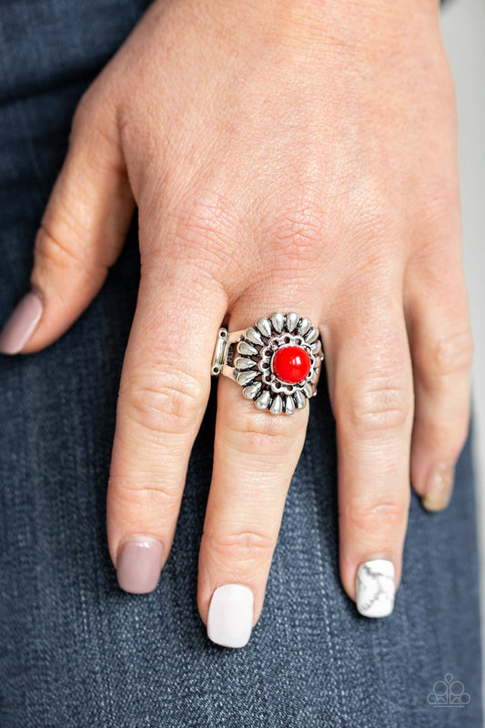 Poppy Pep - Red and Silver Fashion Ring - Paparazzi Accessories - A fiery red bead is nestled atop a stacked floral frame, creating a colorful flower atop the finger. Features a stretchy band for a flexible fit. Sold as one individual ring.
