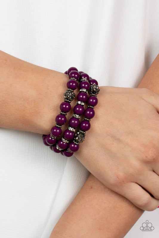Poshly Packing - Dark Purple Bracelet - Paparazzi Accessories - A posh collection of polished purple beads, studded gunmetal rings, white rhinestone encrusted rings, and hematite dotted beads are threaded along stretchy bands around the wrist, creating sassy layers. Sold as one set of three bracelets.  Bejeweled Accessories By Kristie - Trendy fashion jewelry for everyone -