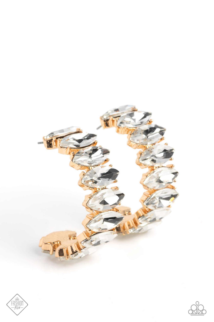 Priceless Pairing - Gold Hoop Earrings - Paparazzi Accessories - Dazzling white marquise-cut gems fall in line along the front edge of a classic gold hoop. The exposed edges create a gritty silhouette, beautifully contrasting with the blinding shimmer of the gems in a stunning finish. Earring attaches to a standard post fitting. Hoop measures approximately 1 1/2" in diameter.