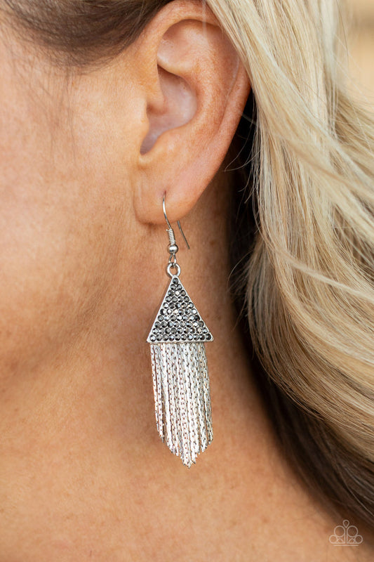 Pyramid Sheen - Silver Hematite Earrings - Paparazzi Accessories - Dainty hematite rhinestones, a silver triangle frame gives way to a tapered fringe of flat silver chains. These fashion earrings attach to standard fishhook fittings.