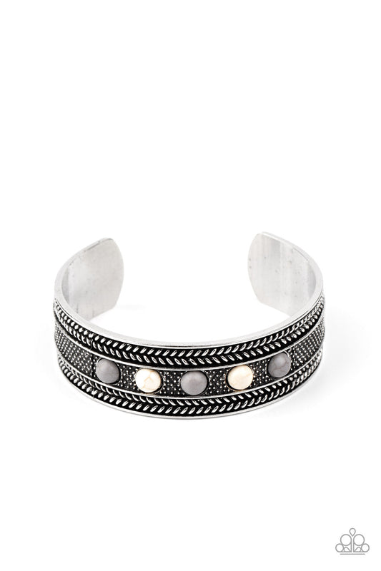 Quarry Quake - Silver - White - Gray Cuff Bracelet - Paparazzi Jewelry - Bejeweled Accessories By Kristie - Dainty white and Sleet stone beads are encrusted along the front of an ornate silver cuff studded and embossed in antiqued rope-like patterns. Sold as one individual bracelet.