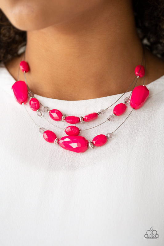 Radiant Reflections - Pink and Silver Fashion Necklace - Paparazzi Accessories - Infused with dainty metallic accents, a collection of faceted pink and sparkling crystal-like beads are threaded along invisible wires below the collar for a whimsically layered look.