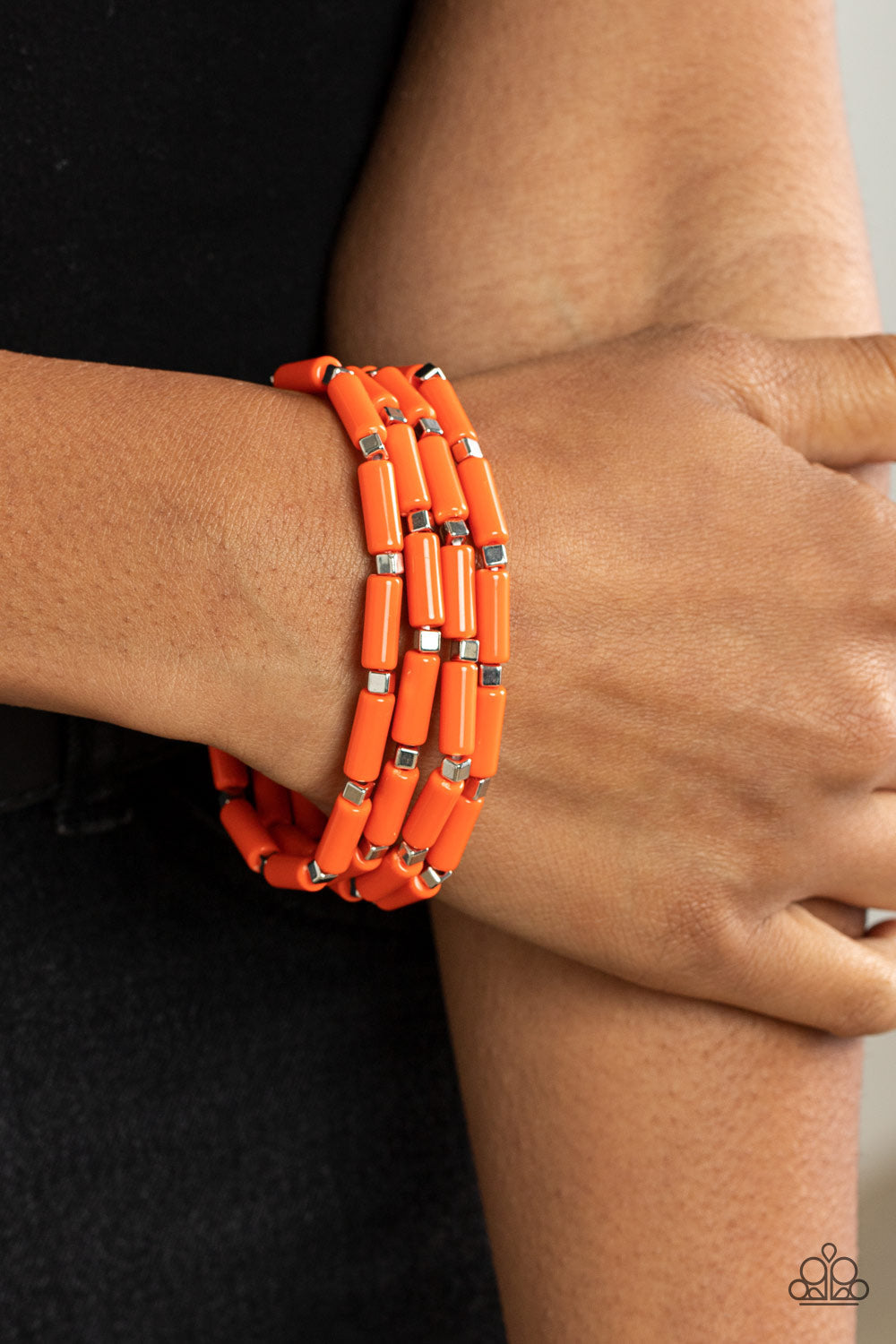 Radiantly Retro - Orange - Silver Stretchy Bracelets - Paparazzi Accessories - Bejeweled Accessories By Kristie - Trendy fashion jewelry for everyone - A playful collection of dainty silver cube beads and cylindrical orange beads along stretchy bands, creating colorful layers around the wrist. Sold as one set of four bracelets.
