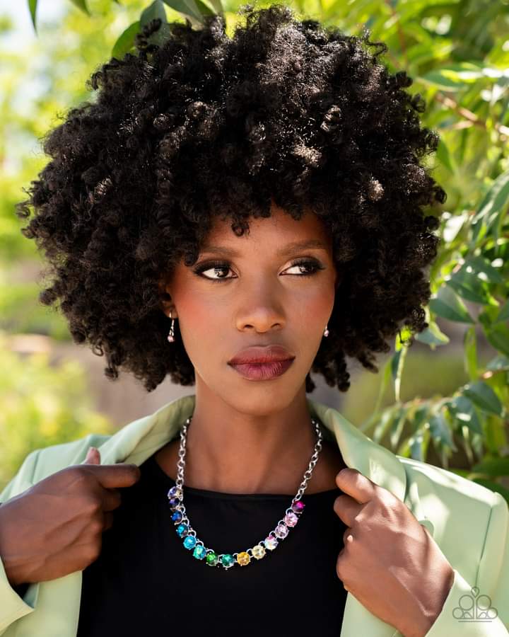 Rainbow Resplendence - Multi Color Fashion Necklace - Paparazzi Accessories - A rainbow of oversized multicolored rhinestones sparkles below the collar for an out-of-this-world statement silver chain necklace.
