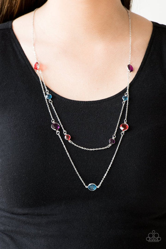 Raise Your Glass - Multi Color and Silver Necklace - Paparazzi Accessories - Varying in size, glassy multicolored gems trickle along dainty silver chains, creating sparkling layers across the chest.
