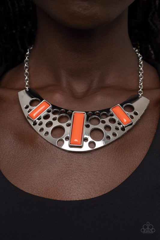 Real Zeal - Orange and Silver Necklace - Paparazzi Accessories - Dotted with vivacious Burnt Orange beaded accents, an oversized silver plate is stenciled in bubbly cutouts as it glistens below the collar for a dramatic fashion.