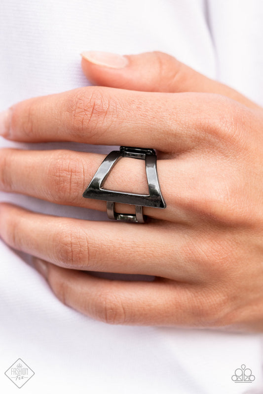 Rebel Edge - Black Metal - Gunmetal Ring - Paparazzi Accessories - Featuring a high sheen finish, flared gunmetal bars create a bold asymmetrical triangle atop the finger. Two small gunmetal bars wrap around the side for an edgy modern finish. Features a stretchy band for a flexible fit. Sold as one individual ring.