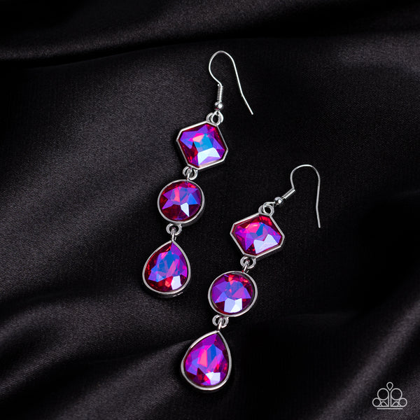 Reflective Rhinestones Pink and Silver Earrings - Paparazzi Accessories - Featuring a stellar UV finish, three iridescent pink rhinestones delicately link into a refined lure. Featuring teardrop, round, and emerald style cuts, the sparkly rhinestones are delicately encased in silver frames, adding a layer of sophisticated shimmer to the glamorous look. Earring attaches to a standard fishhook fitting. Due to its prismatic palette, color may vary. Sold as one pair of earrings.