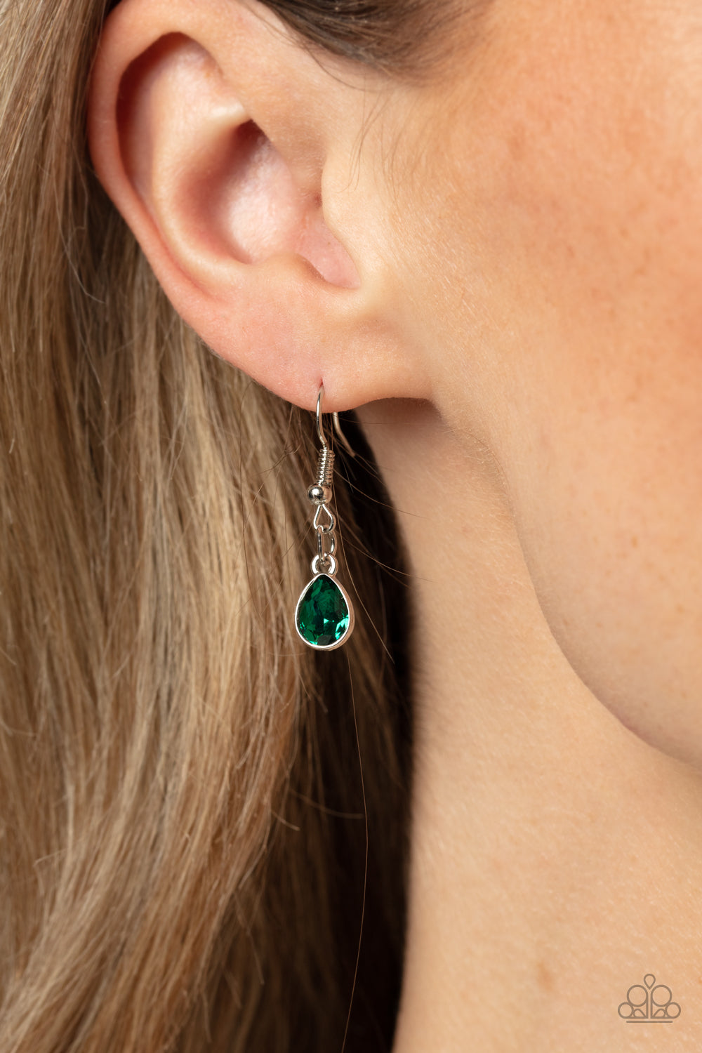 Regally Refined - Green and Silver Necklace - Paparazzi Accessories - A dramatic emerald shade, a collection of teardrop gems hanging from a sleek, silver snake chain, are pressed into high-sheen silver casings, creating a colorful fringe below the collar. Linking each teardrop together, dainty white rhinestones border the tops and bottoms of each shape, creating additional eye-catching dazzle.