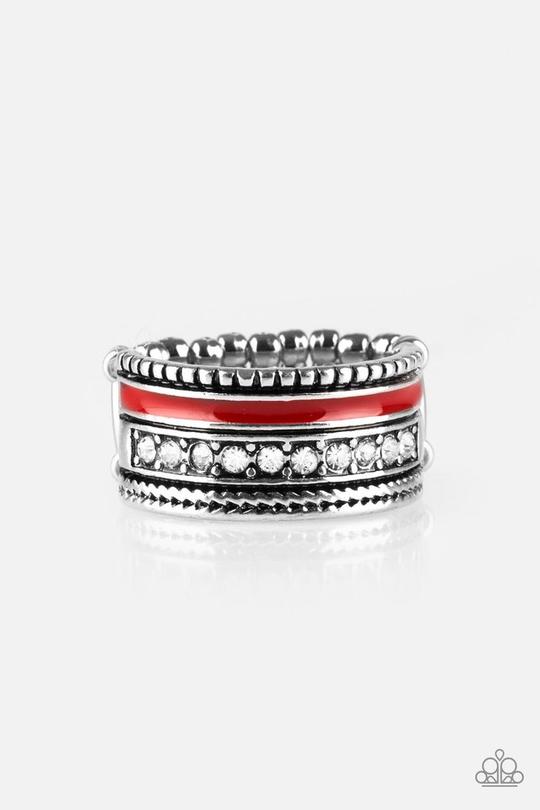Rich Rogue - Red and Silver Fashion Ring - Paparazzi Accessories - A shiny red strip of color runs along the bottom of a row of glassy white rhinestones. Infused with silver textures, the mismatched details coalesce into one thick band across the finger. Features a stretchy band for a flexible fit. Sold as one individual ring.