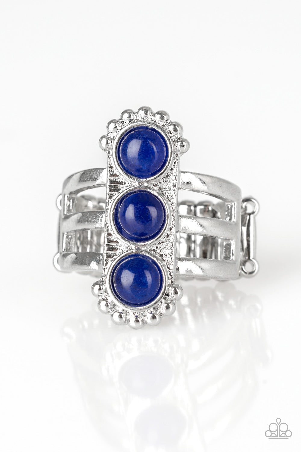 Rio Trio - Blue and Silver Fashion Ring - Paparazzi Accessories - Infused with glassy blue beads, a studded silver frame is pressed into the center of a layered silver band for a seasonal look. Features a stretchy band for a flexible fit. Sold as one individual ring.