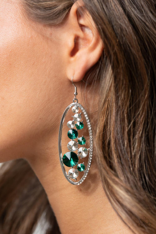 Rock Candy Bubbly - Green and Silver Earrings - Paparazzi Accessories - An oversized collection of glassy white and glittery green rhinestones sparkle inside a silver oval frame. One side of the frame is encrusted in dainty white rhinestones, adding a refined flair to the bubbly lure. Earring attaches to a standard fishhook fitting. Sold as one pair of earrings.