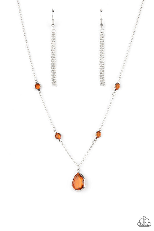 Romantic Rendezvous - Brown Gem - Silver Necklace - Paparazzi Accessories - A stunning brown teardrop gem encased in a silver frame dips elegantly below the collar. Small round brown gems accent the silver chain for a delicate and dreamy display.