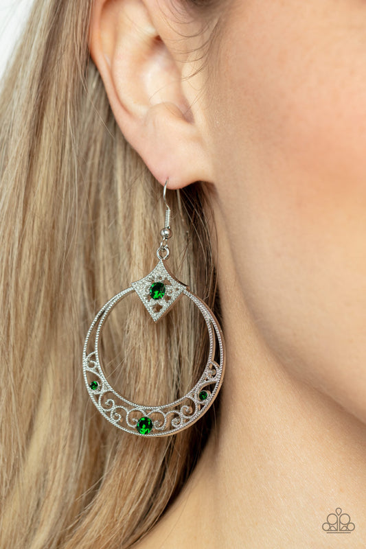 Royal Resort - Green and Silver Earrings - Paparazzi Accessories - Studded silver filigree swirls inside the bottom of a shiny silver hoop that is crowned in a diamond-shaped frame. Glittery green rhinestones are sprinkled along the vine-like motifs, adding a glitzy finish to the seasonal inspired frame. Earring attaches to a standard fishhook fitting. Sold as one pair of earrings.