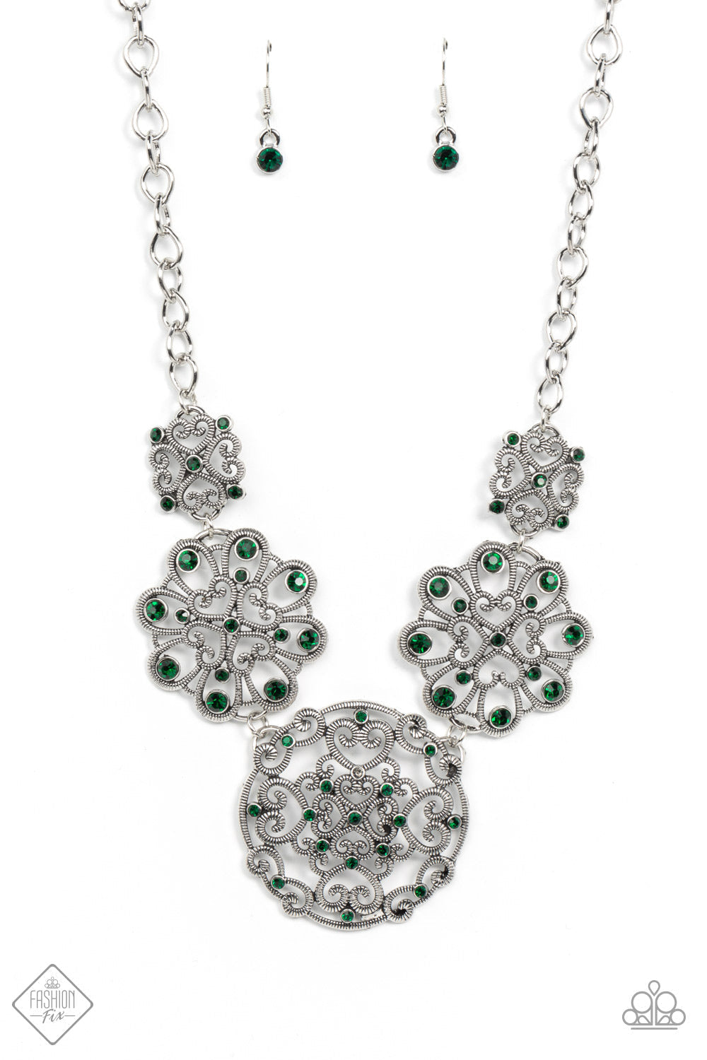 Royally Romantic - Green and Silver Fashion Necklace - Paparazzi Accessories - Exquisite heart motifs dotted with dainty emerald rhinestones coalesce into airy medallions that link to a modest silver chain for a stylish fashion necklace.