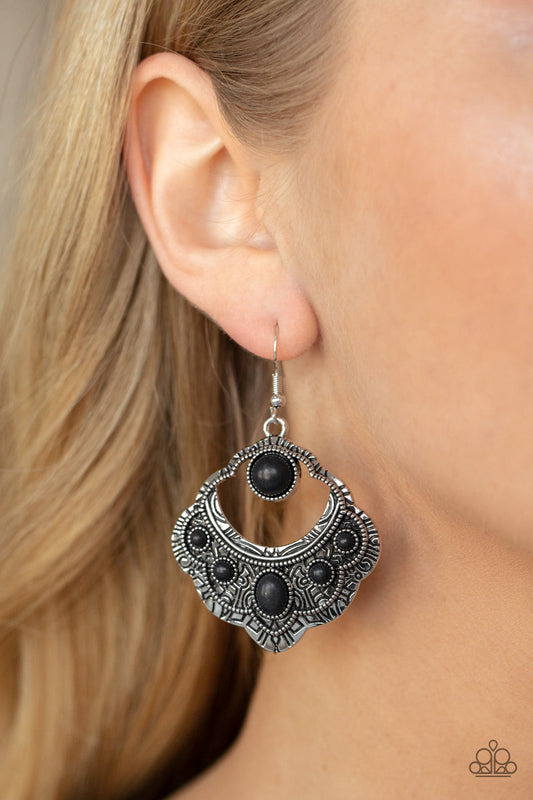 Saguaro Sunset - Black and Silver Earrings - Paparazzi Accessories - An earthy assortment of oval and round black stones adorn the front of a scalloped silver frame that is studded and engraved in tribal inspired details. Earring attaches to a standard fishhook fitting.