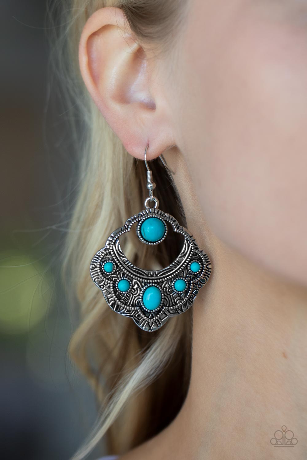 Saguaro Sunset - Blue Turquoise Stone - Silver Earrings - Paparazzi Accessories - An earthy assortment of oval and round turquoise stones adorn the front of a scalloped silver frame that is studded and engraved in tribal inspired details. Earring attaches to a standard fishhook fitting. 