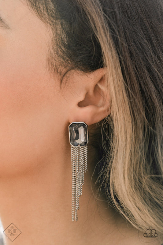Save for a REIGNy Day - Silver Smoky Gem Earrings - Paparazzi Accessories - Tapered silver chains stream from the bottom of an oversized smoky emerald cut gem, creating a regal fringe. Earring attaches to a standard post fitting. Sold as one pair of post earrings.