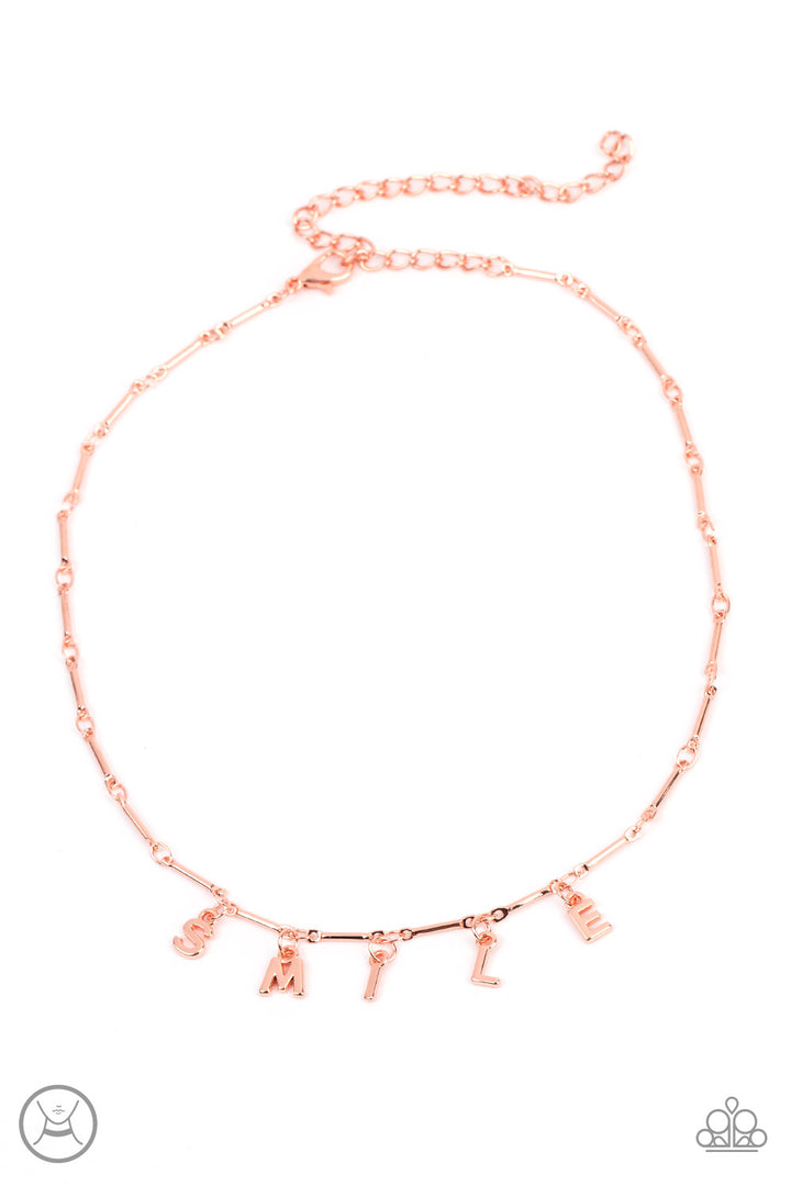 Say My Name - Copper Necklace - Paparazzi Accessories - Separated by dainty copper rods, copper letters spell out the word SMILE in a soft, and simple manner. Features an adjustable clasp closure.