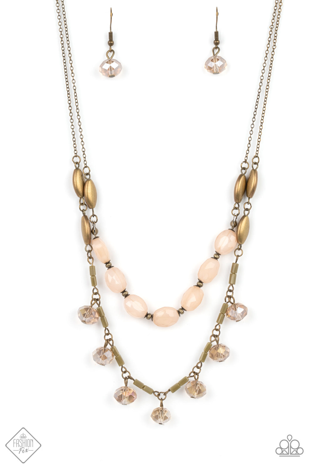 Sheen Season - Brass and Peach Necklace - Paparazzi Accessories - Two strands of dainty brass chain are adorned in a collection of peachy opaque beads, faceted glass beads, and brass accents, culminating in a layered design rich with vintage character. The glassy beads that swing along the lower chain feature a subtle reflective surface in a cozy peach glow