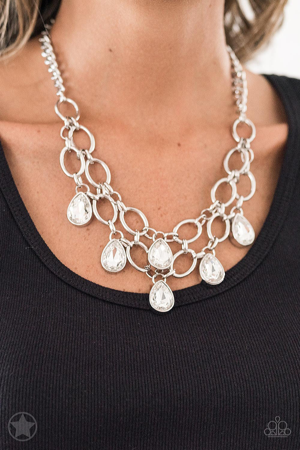 Show - Stopping Shimmer - Silver Fashion Necklace - Paparazzi Accessories - Two rows of silver chain layer below the collar for a fierce fashion. Glittery white teardrops gems hang from the glistening layers for a timeless shimmer to the show-stopping statement style. Necklace has an adjustable clasp closure.