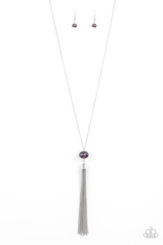 Socialite of the Season - Purple and Silver Necklace - Paparazzi Accessories - A glittery purple crystal-like bead swings from the bottom of a lengthened silver chain, giving way to a shimmering silver tassel for a glamorous finish. Features an adjustable clasp closure. Sold as one individual necklace.