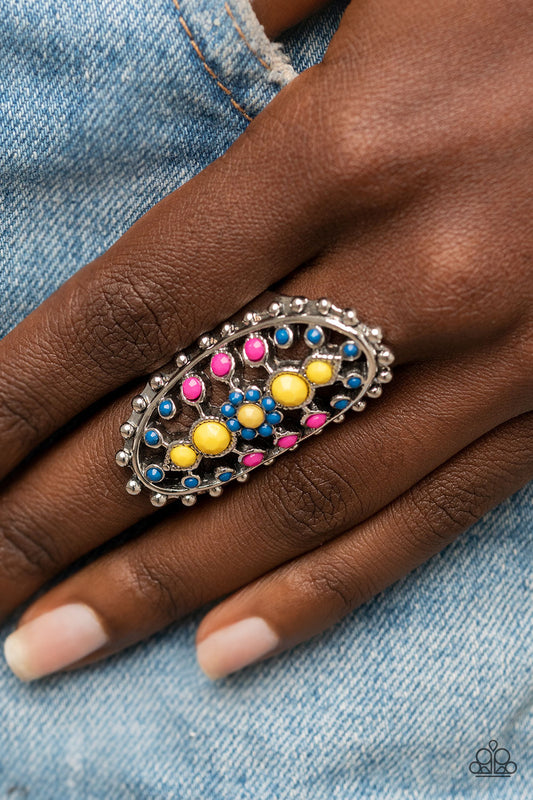 Sonoran Solstice - Blue Multi Color Ring - Paparazzi Accessories - Dainty Illuminating, Mykonos Blue, and Fuchsia Fedora beads dot the airy front of a studded silver oval frame, creating a colorful floral pattern across the finger. Features a stretchy band for a flexible fit. Sold as one individual ring.