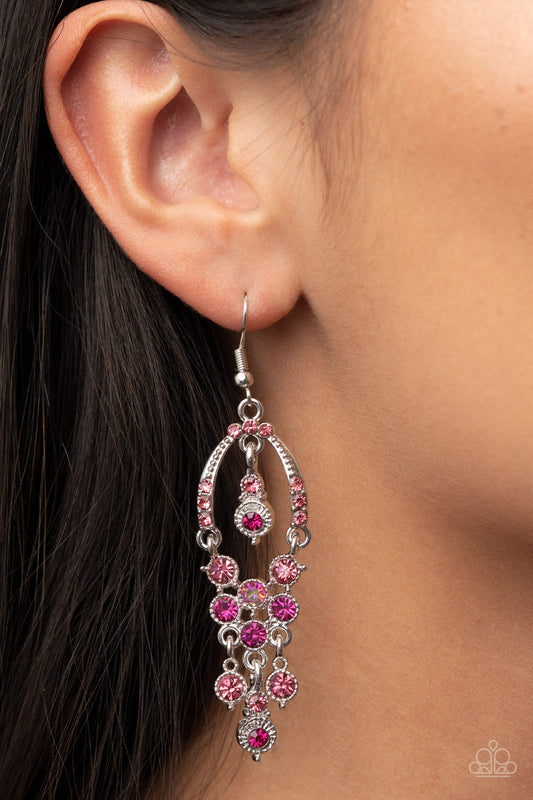 Sophisticated Starlet - Fuchsia Pink and Iridescent Earrings - Paparazzi Accessories - A pink rhinestone encrusted silver horseshoe frame delicately attaches to a glitzy tassel of pink, Fuchsia Fedora, and iridescent rhinestones for a timeless twinkle. A matching pink and Fuchsia Fedora rhinestone embellished frame daintily swings from the top of the glamorous frame, complimenting the effervescent movement. Earring attaches to a standard fishhook fitting. Sold as one pair of earrings.